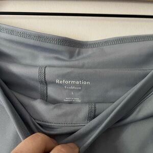 Reformation ecomove skort light blue size Large